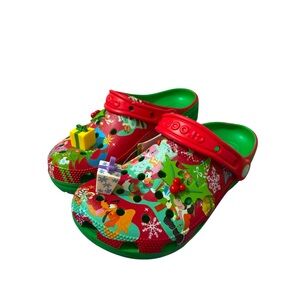 Disney Christmas CROCS. New with tags! 
Men size 5 women’s 7
